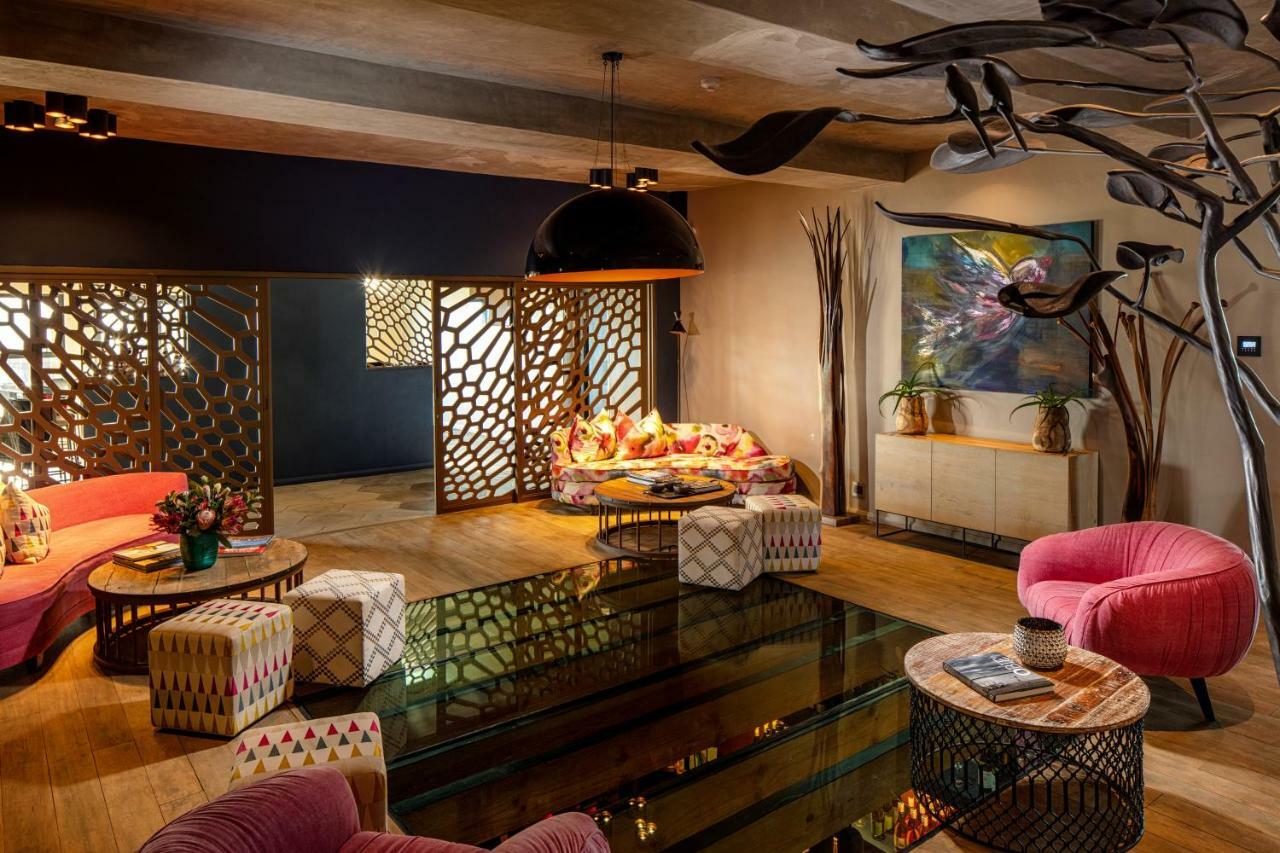 สกายวิลล่า บูทีค โฮเทล เพลตเตนเบิร์กเบย์ ภายนอก รูปภาพ The interior of the restaurant